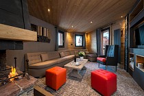 Chalet Altitude - woonkamer met tv en openhaard